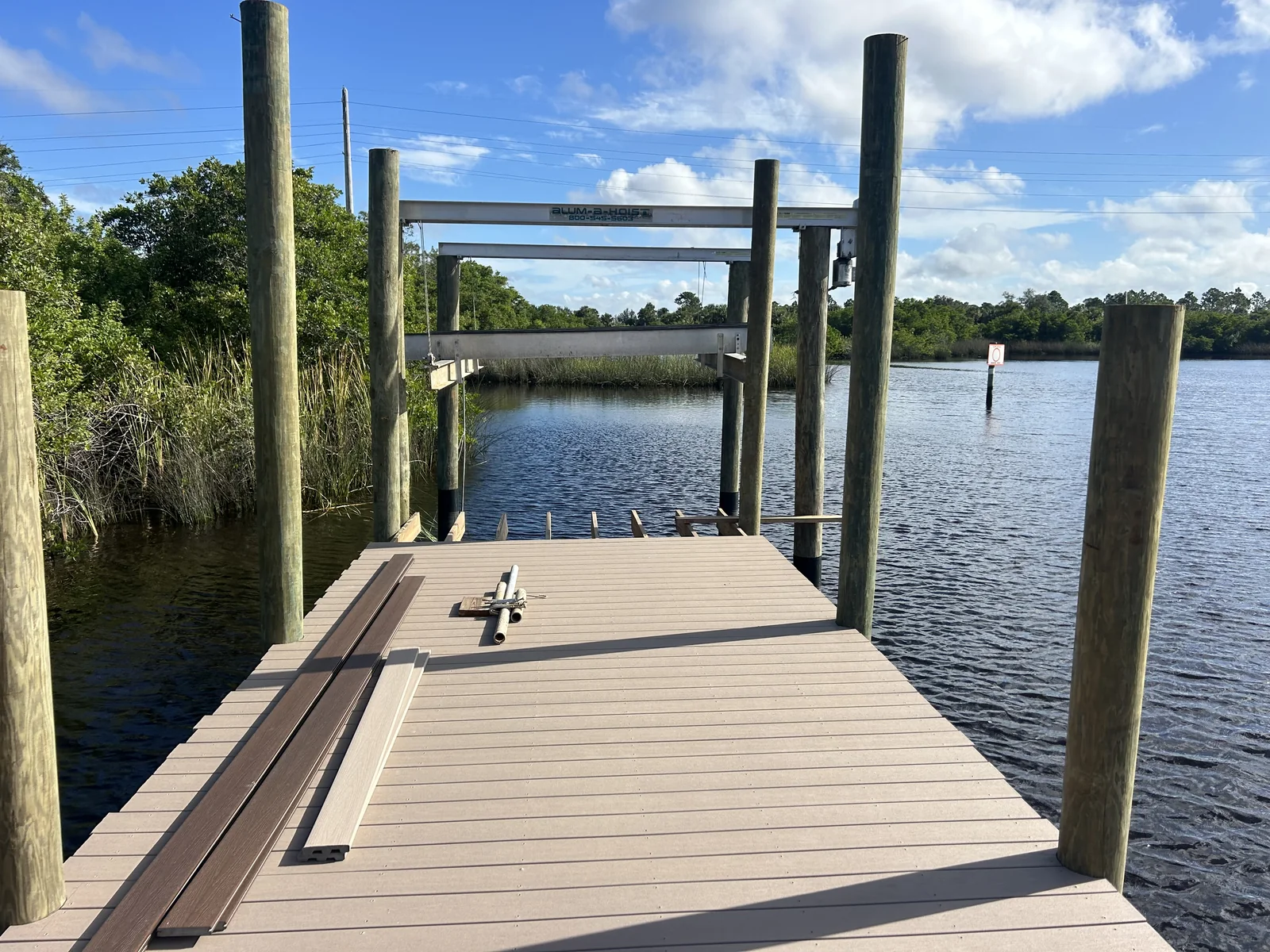 Dock decking and boat lift beams during construction