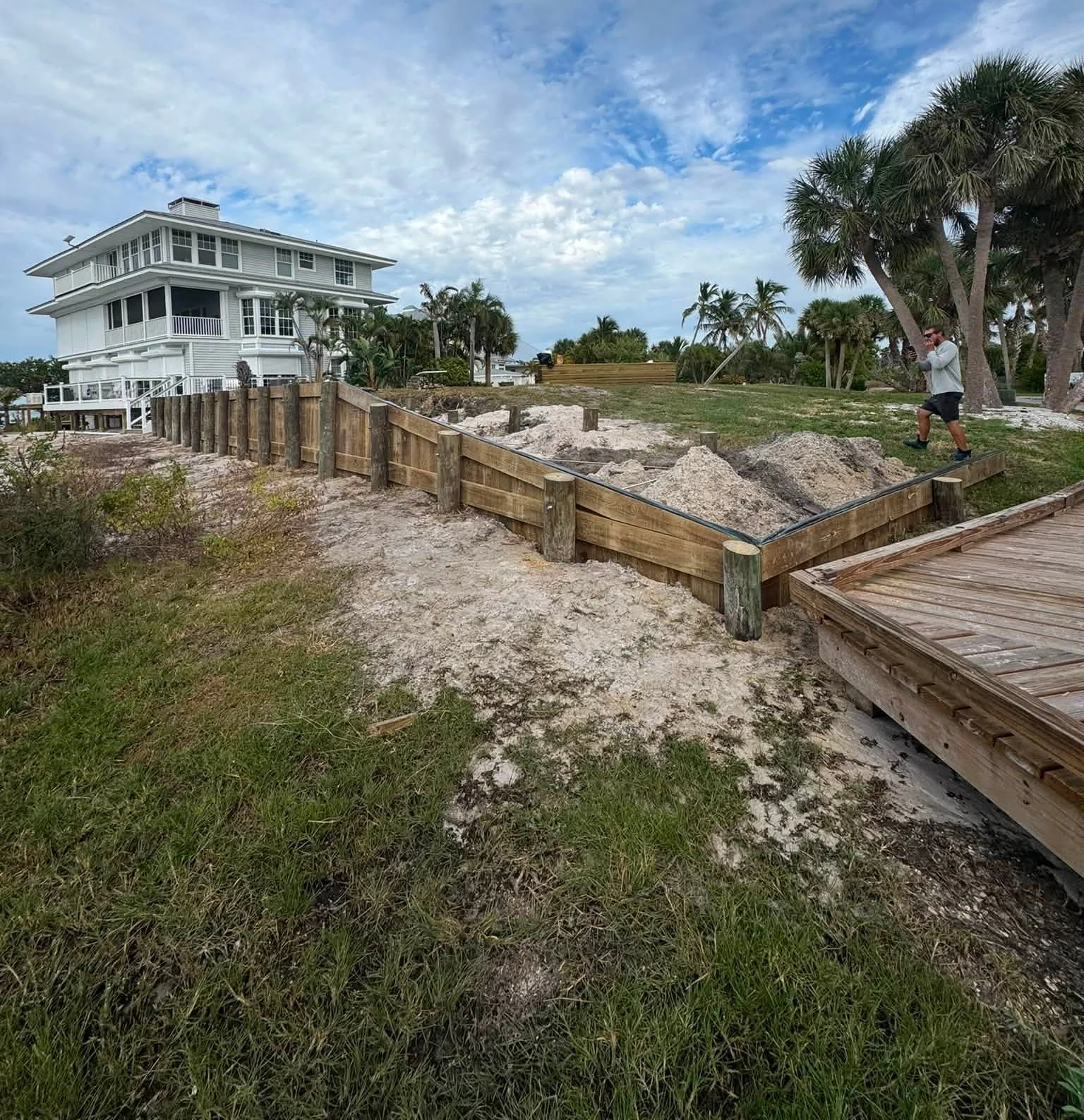Timber bulkhead corner beside a boardwalk at Useppa Island